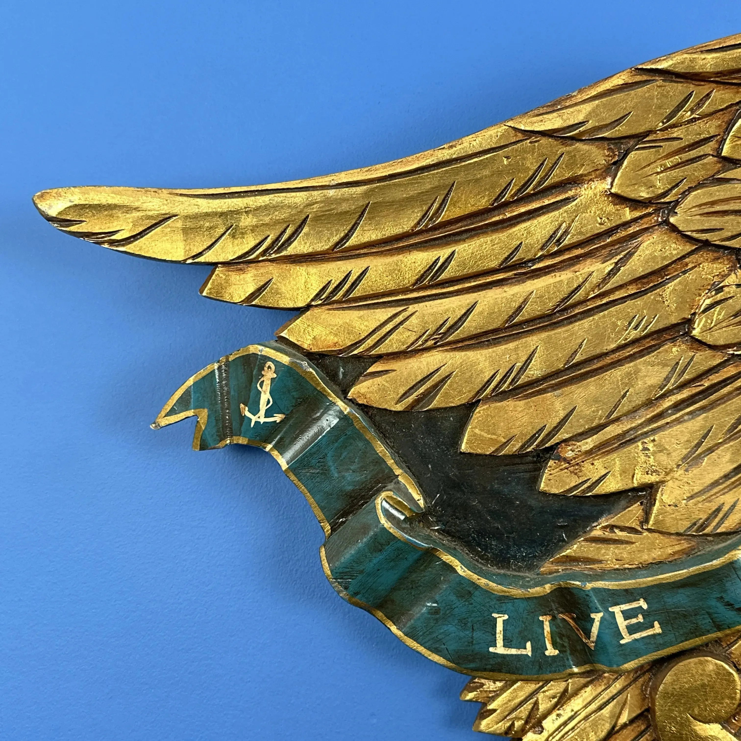 Carved wooden eagle — "Live and Let Live" — 36" wide