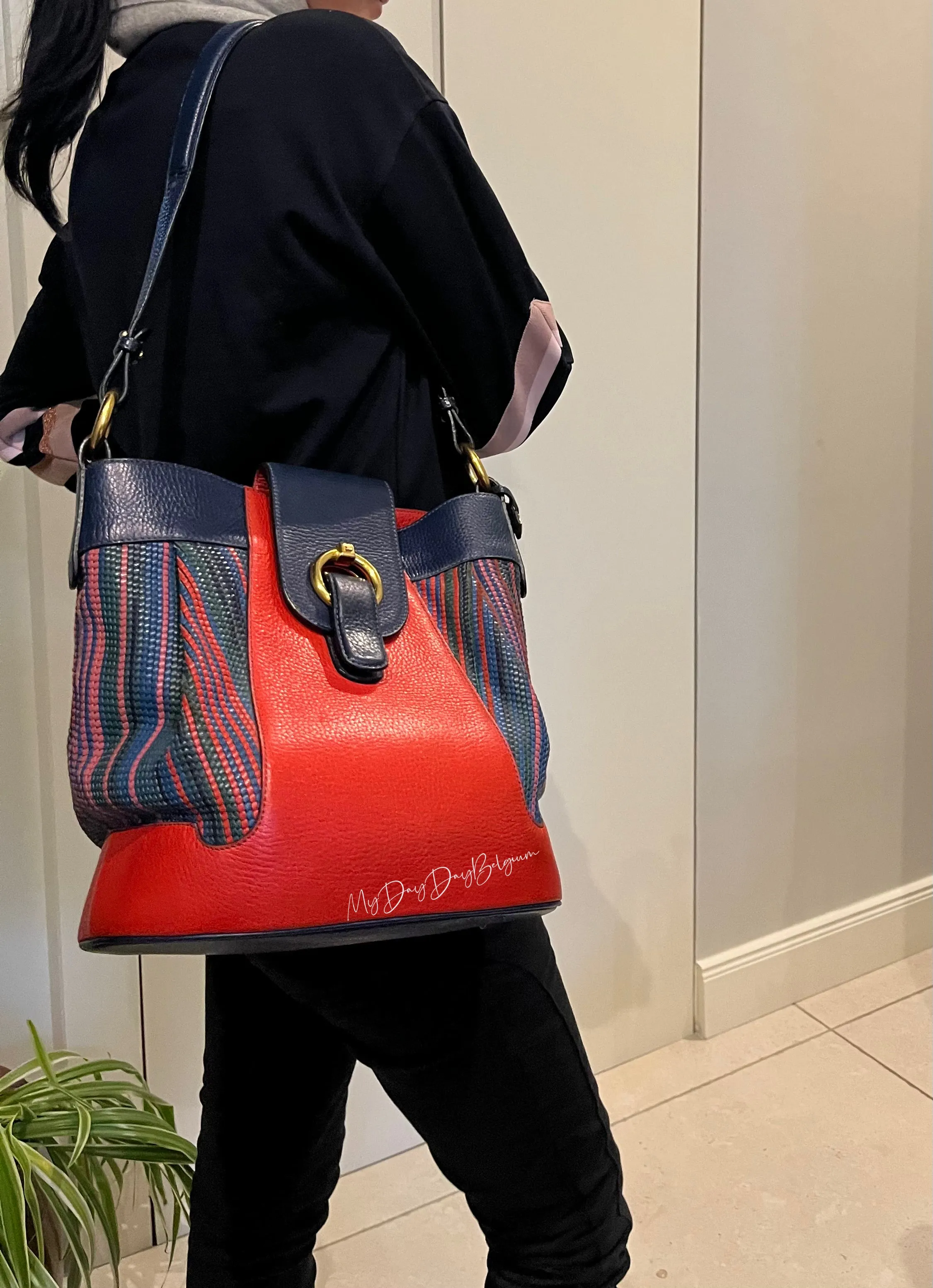 Delvaux vintage crossbody bag in orange red toile de cuir mid 90s